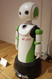 ⑤ロボットとのコミュニケーション <br />
『ロボビー』２０１０年（北海道大学大学院情報科学研究院ヒューマンコンピュータインタラクション研究室蔵）
